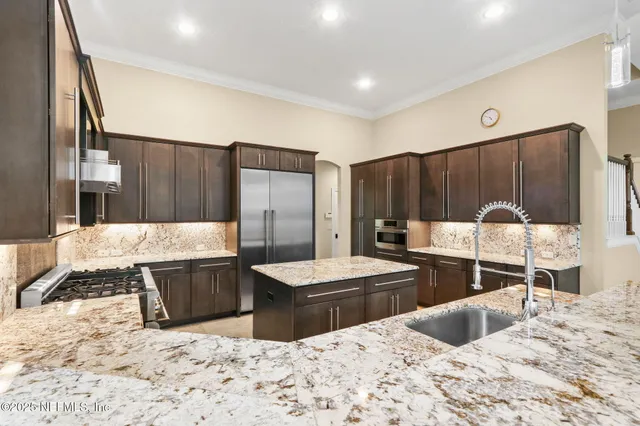 a view of a hallway with seating area