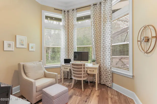 a view of a chairs and table in the patio