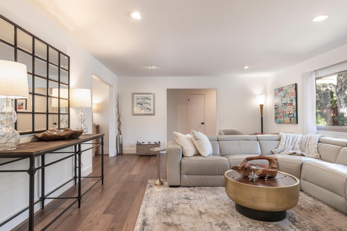 3128 Stevenson Drive Pebble Beach, CA 93953 - Photo 12 of 35 a living room with furniture and a potted plant