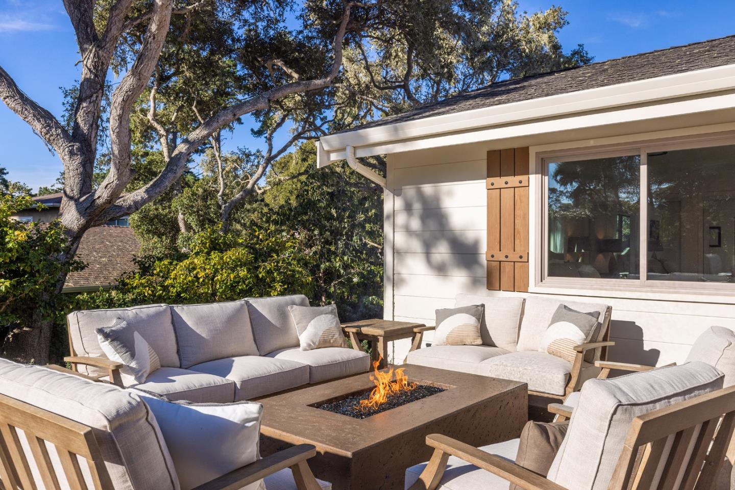 3128 Stevenson Drive Pebble Beach, CA 93953 - Photo 28 of 35 a outdoor space with patio couches and a potted plant