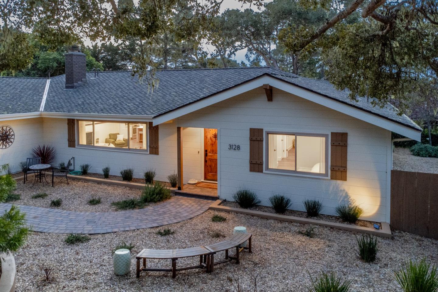 3128 Stevenson Drive Pebble Beach, CA 93953 - Photo 5 of 35 a backyard of a house with yard fire pit and outdoor seating