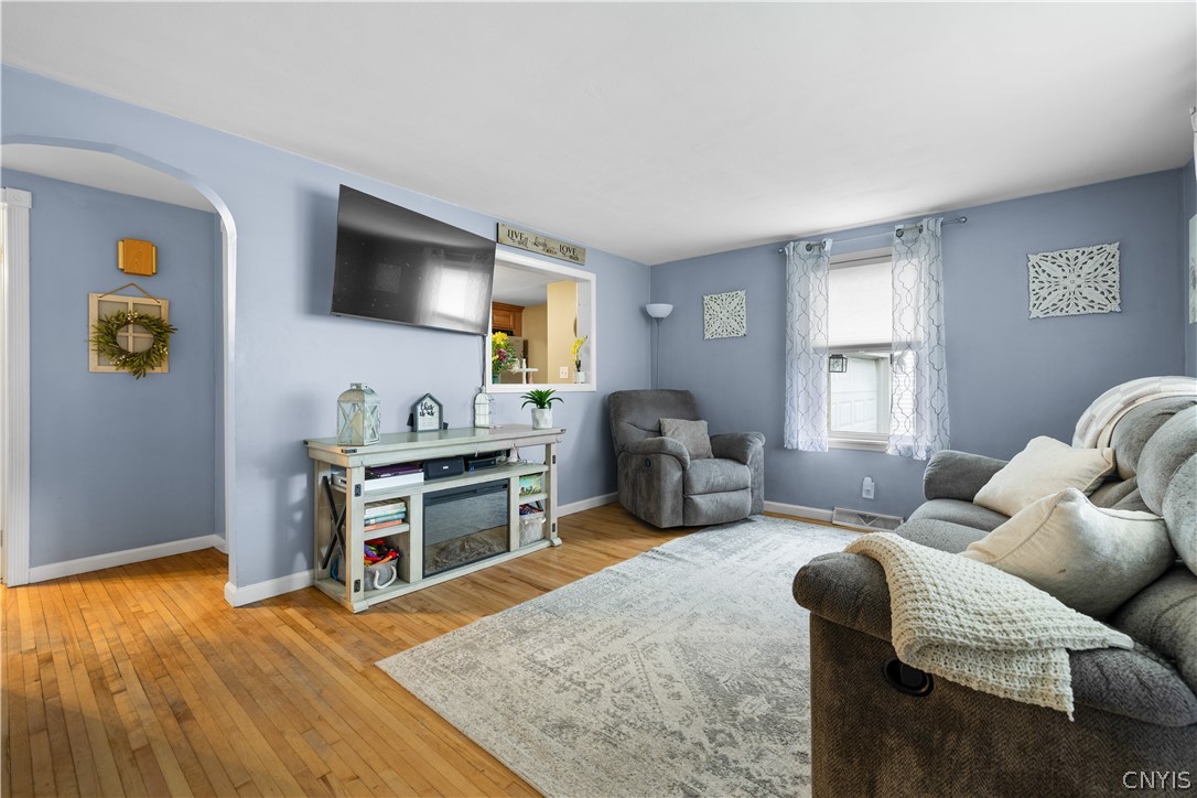 5464 Kenwood Road Utica, NY 13502 - Photo 4 of 19 Living Room With Hardwood Floors