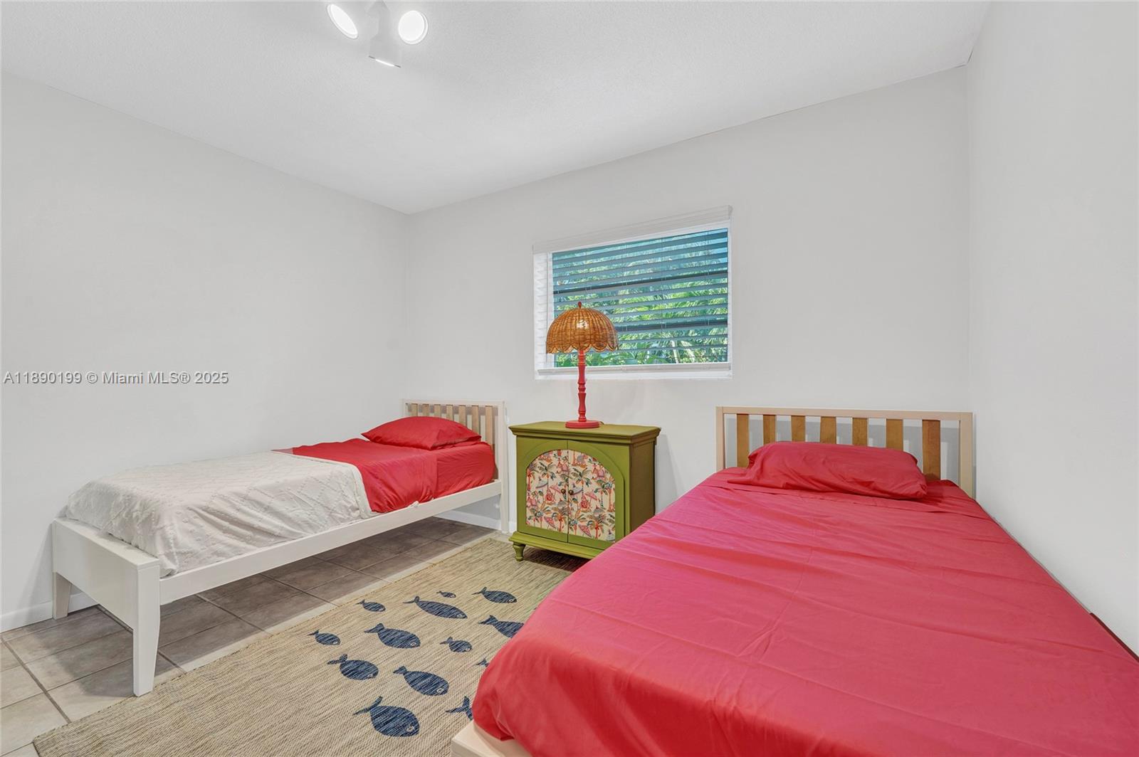 1129 Pebble Beach Lane, Unit 6 Marathon, FL 33050 - Photo 12 of 31 a bedroom with a bed and window