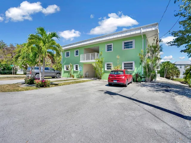a car parked in front of a house
