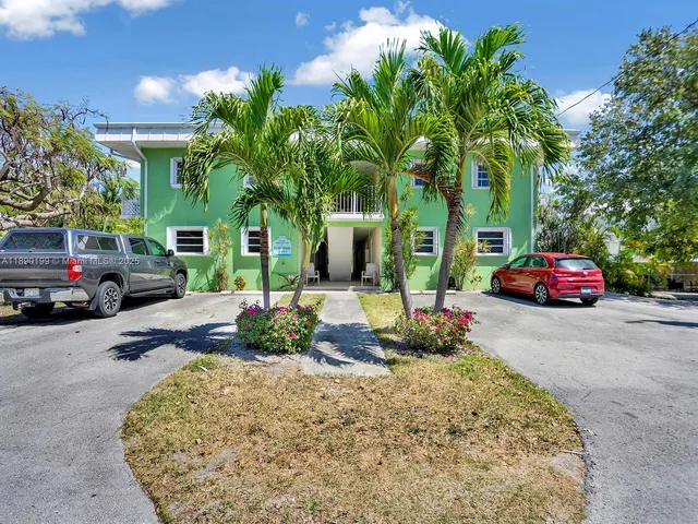 a cars parked in front of a house