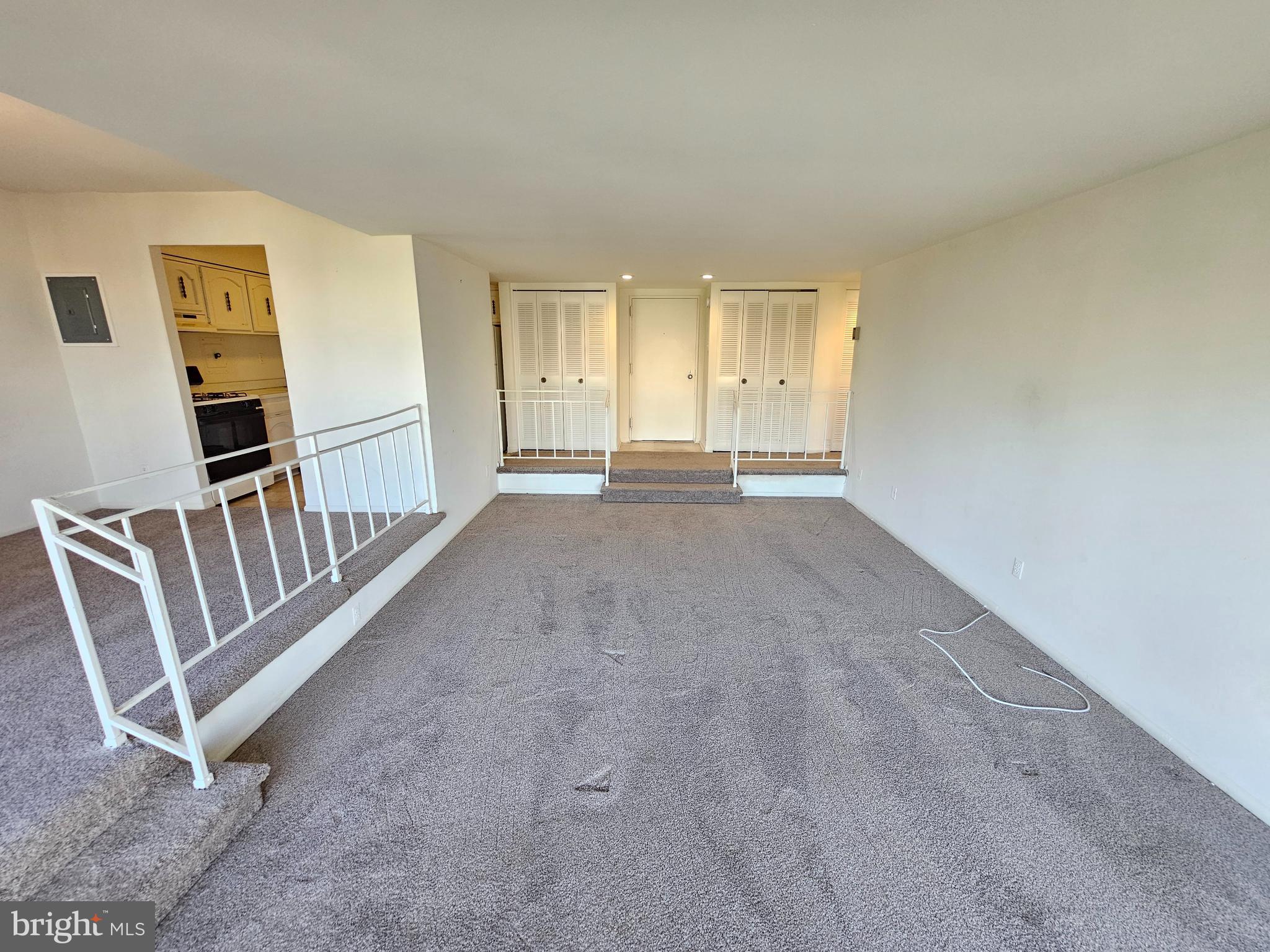9900 Georgia Avenue, Unit 415 Silver Spring, MD 20902 - Photo 7 of 25 a view of an empty room with a window