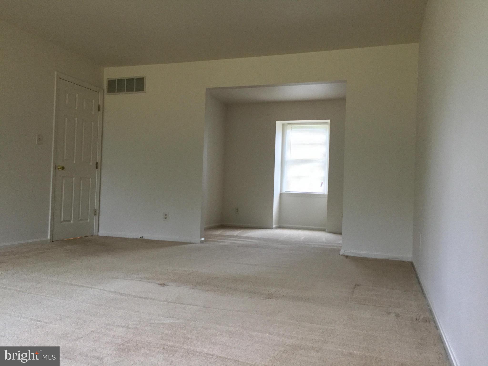 12205 Pleasant Prospect Bowie, MD 20721 - Photo 14 of 30 a view of an empty room with a window