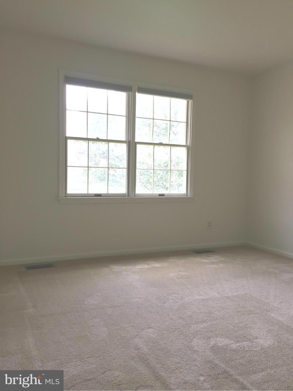 12205 Pleasant Prospect Bowie, MD 20721 - Photo 19 of 30 an empty room with a window