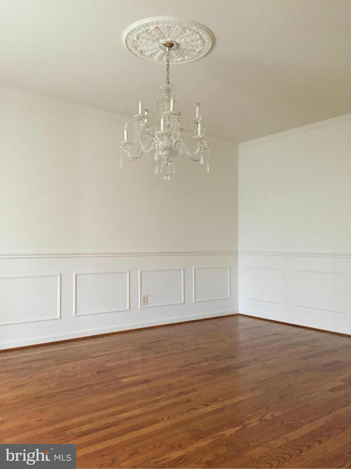 12205 Pleasant Prospect Bowie, MD 20721 - Photo 5 of 30 a view of an empty room with wooden floor