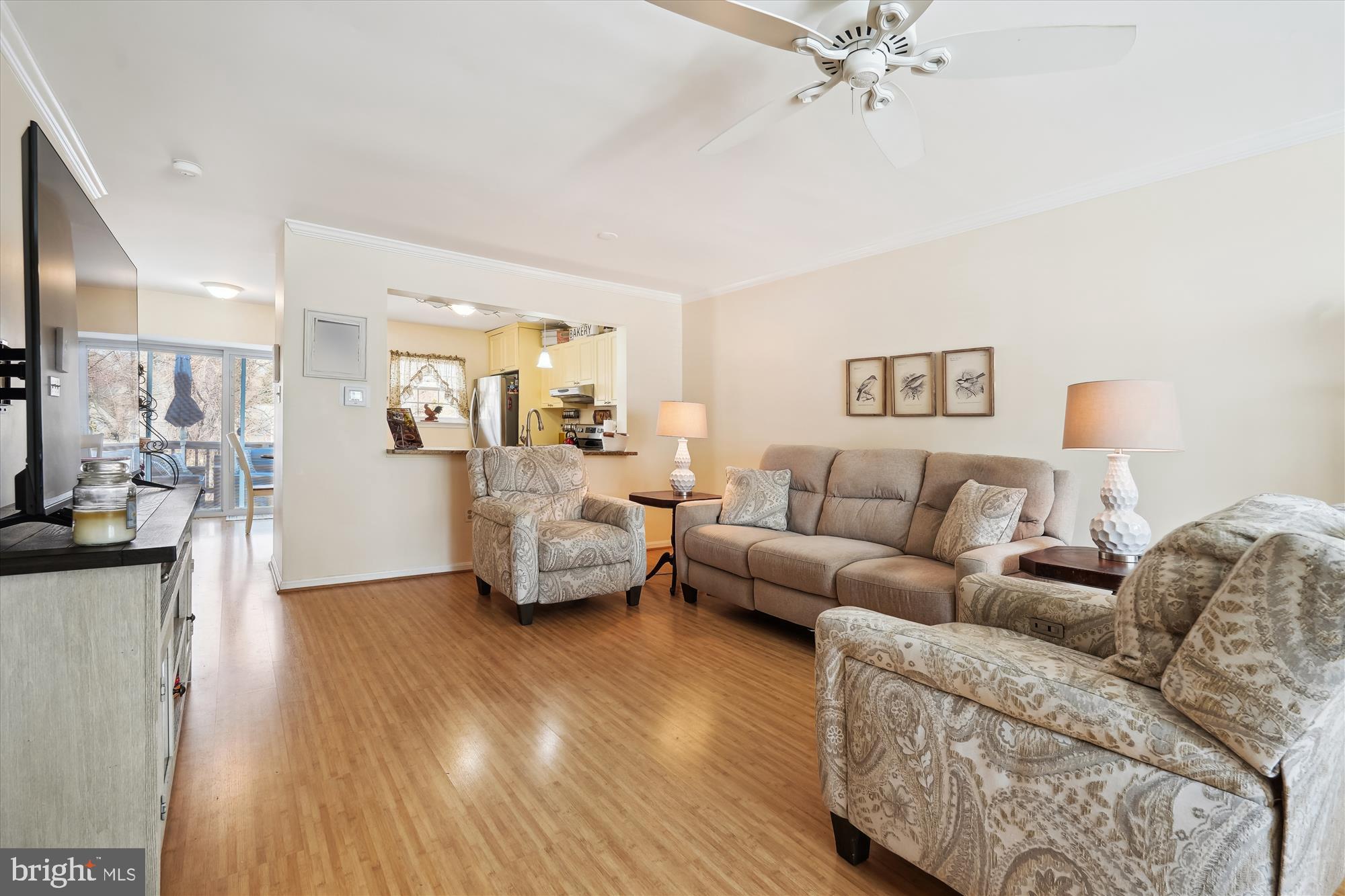 18244 Fox Chase Circle Olney, MD 20832 - Photo 14 of 26 a living room with furniture and a wooden floor