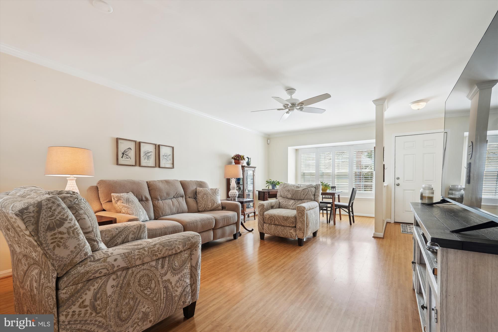 18244 Fox Chase Circle Olney, MD 20832 - Photo 15 of 26 a living room with furniture and a wooden floor