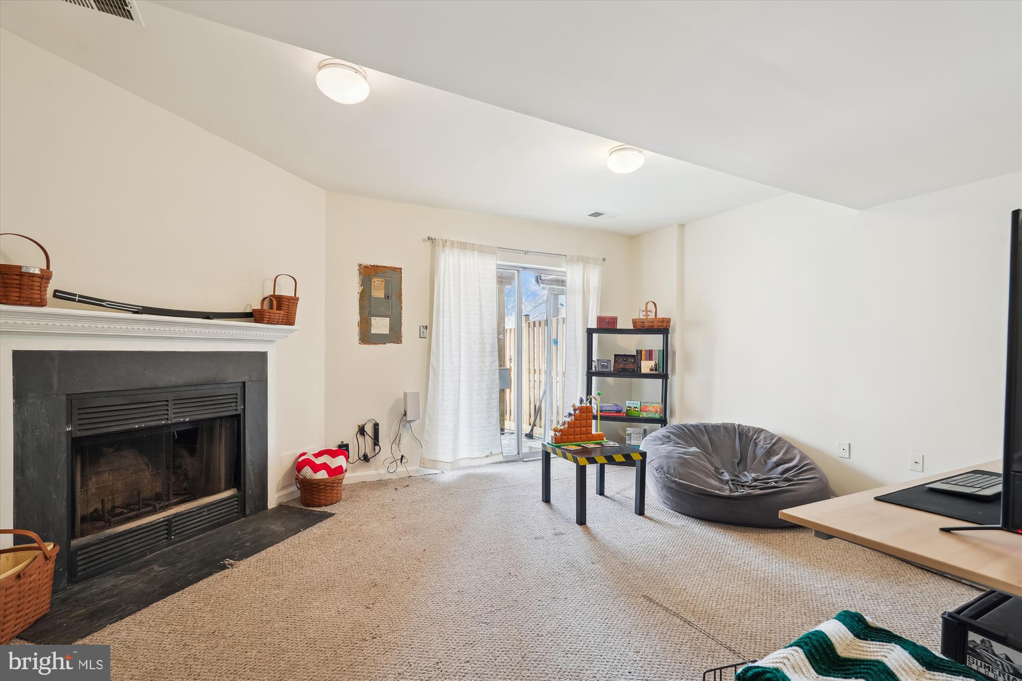 18244 Fox Chase Circle Olney, MD 20832 - Photo 26 of 26 a bedroom with furniture and a fireplace