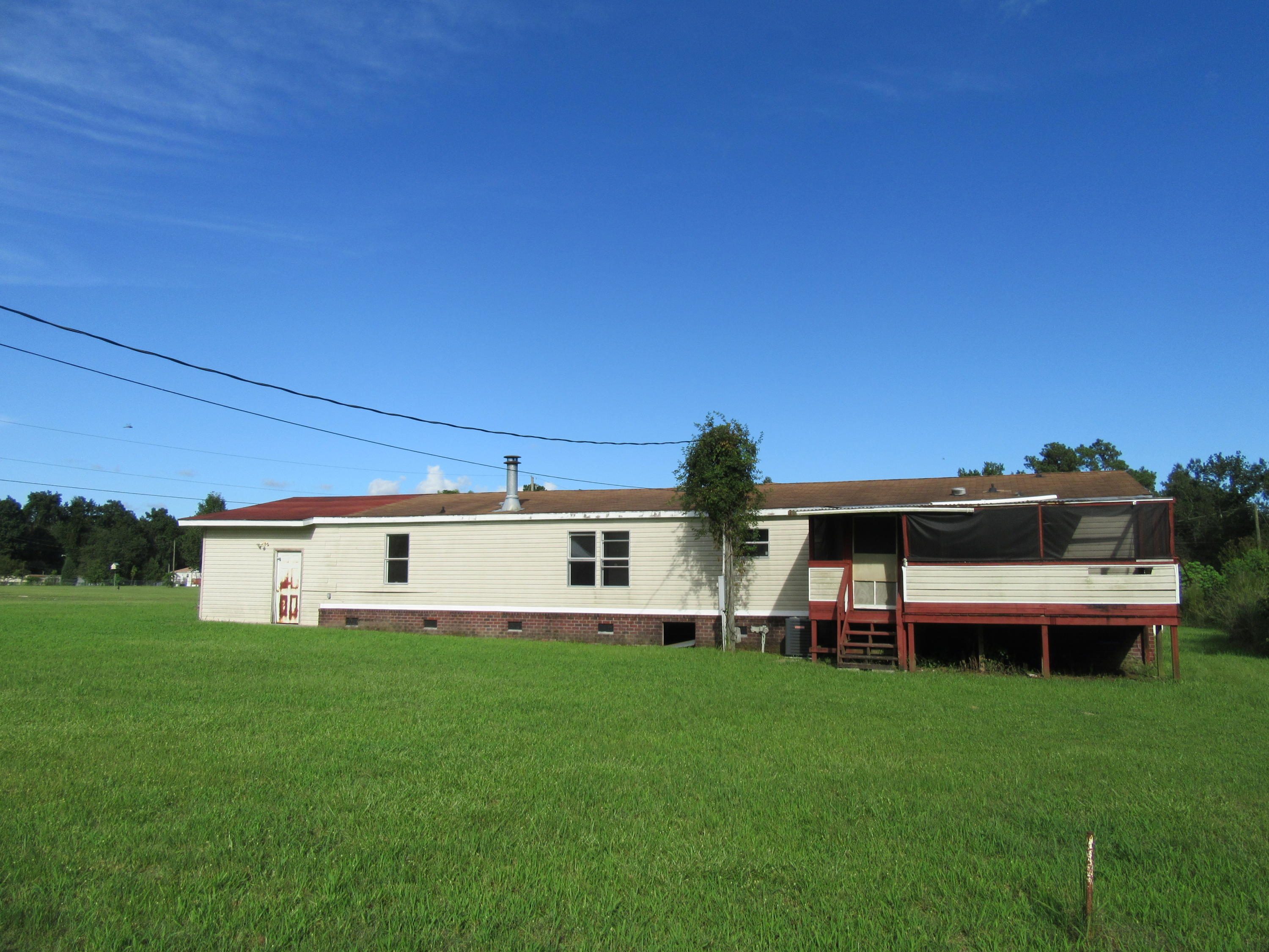 178 Wagon Trail Road Ridgeville, SC 29472 - Photo 2 of 12 Full exterior view