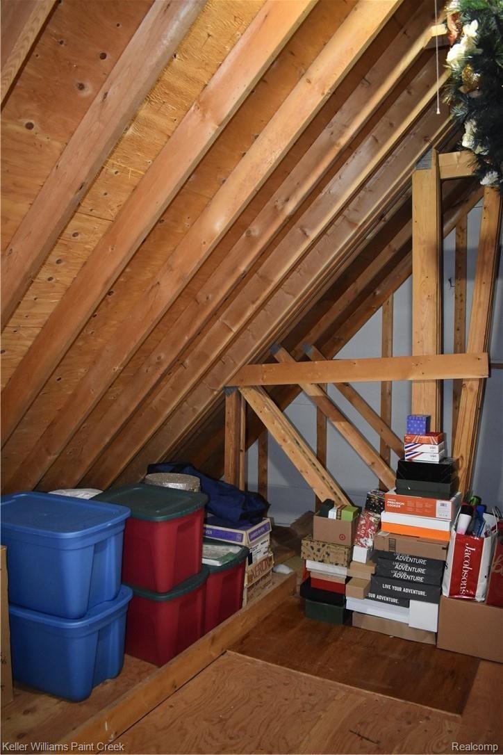 1993 Ridgefield Court Rochester, MI 48306 - Photo 33 of 47 OFF THE 2ND BEDROOM WALK-IN CLOSET THERE IS A LARGE STORAGE AREA (9 X 10)