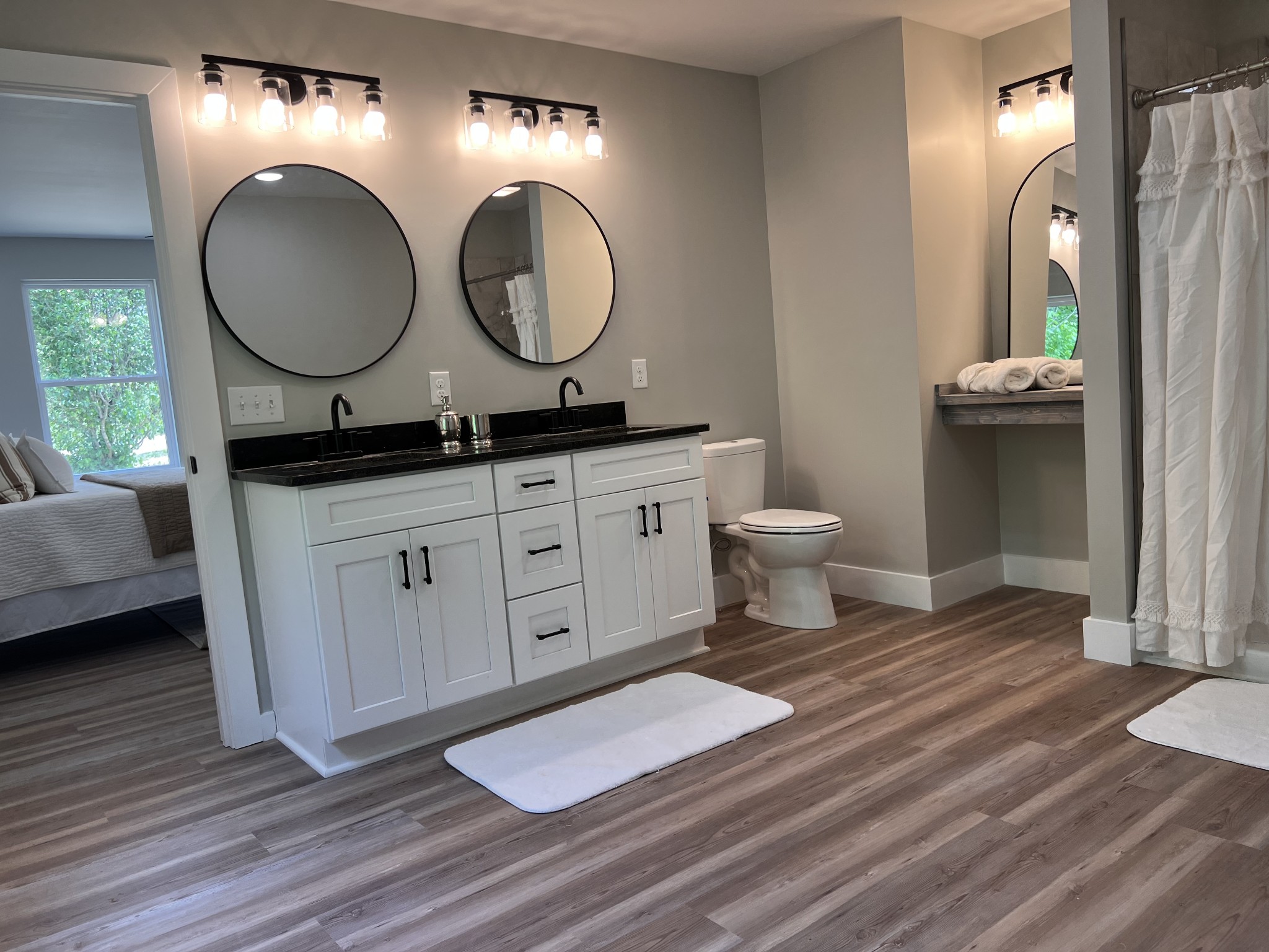 417 Defeated Creek Highway Carthage, TN 37030 - Photo 13 of 30 a bathroom with a toilet a sink and a mirror