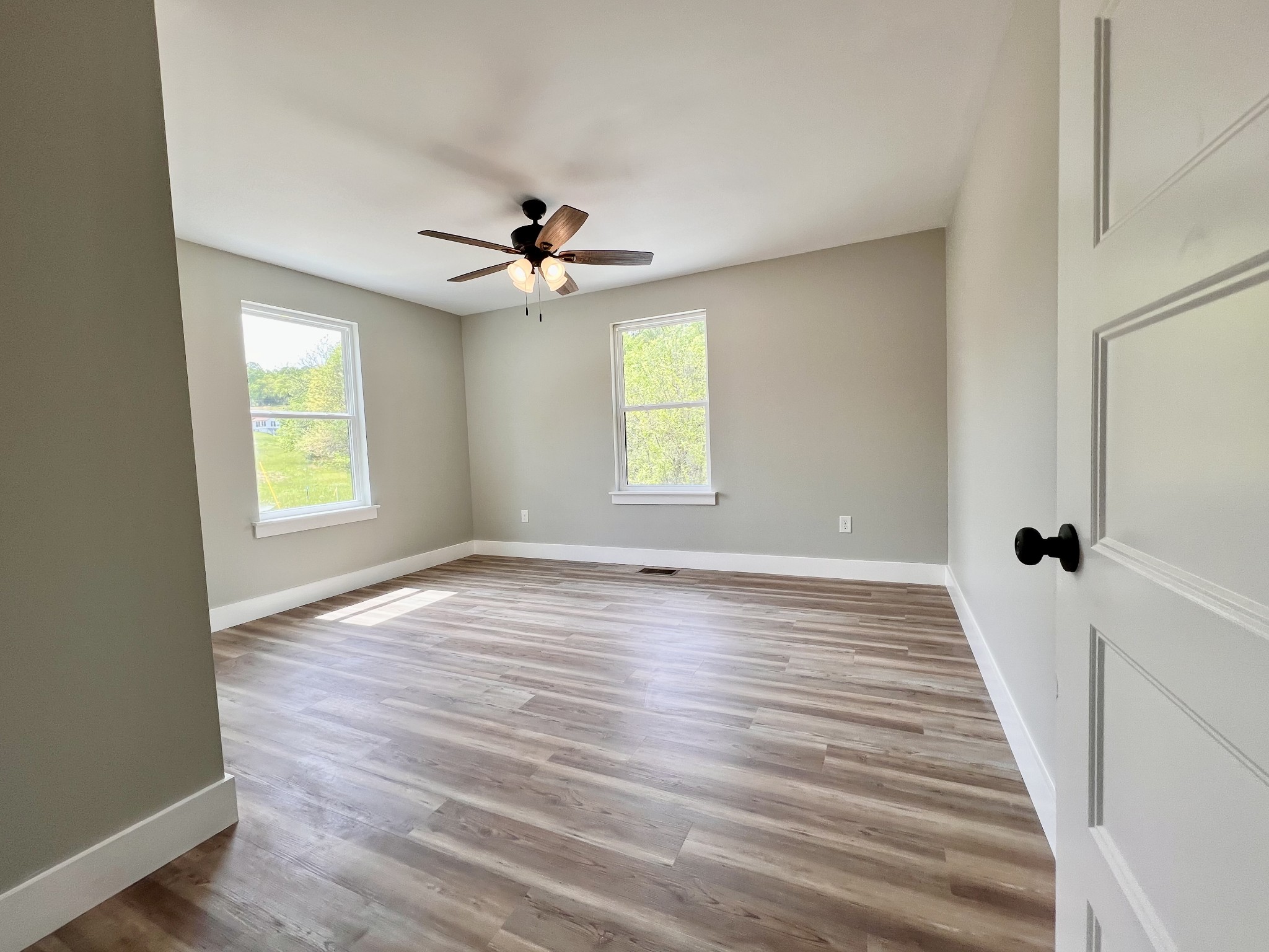 417 Defeated Creek Highway Carthage, TN 37030 - Photo 17 of 30 wooden floor in an empty room with a window