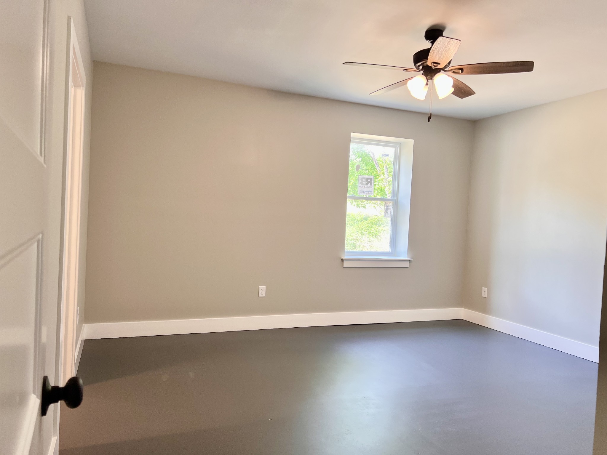 417 Defeated Creek Highway Carthage, TN 37030 - Photo 21 of 30 an empty room with a window and a fan