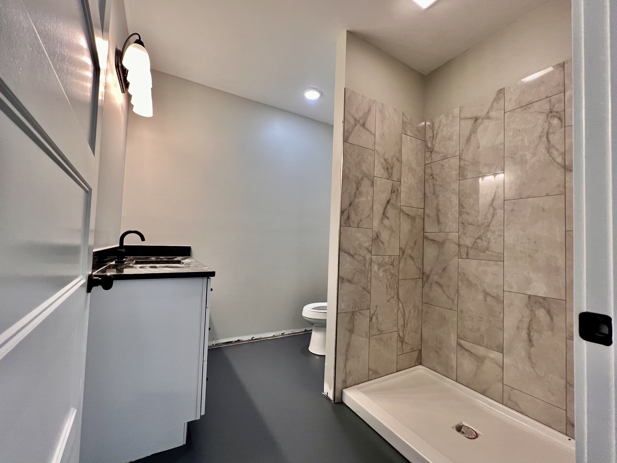 417 Defeated Creek Highway Carthage, TN 37030 - Photo 22 of 30 a bathroom with a sink a toilet and shower