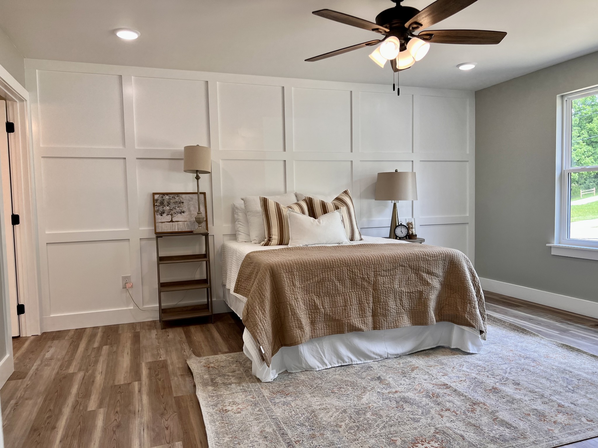 417 Defeated Creek Highway Carthage, TN 37030 - Photo 10 of 30 a spacious bedroom with a bed and a ceiling fan