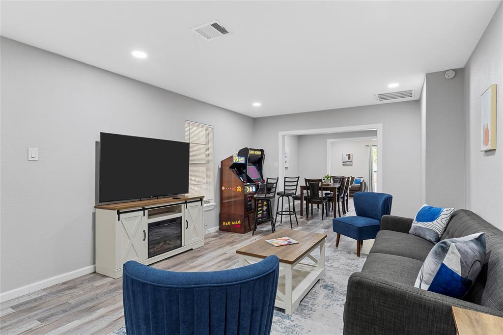 1900 North 6th Street Waco, TX 76708 - Photo 5 of 23 a living room with furniture and a flat screen tv