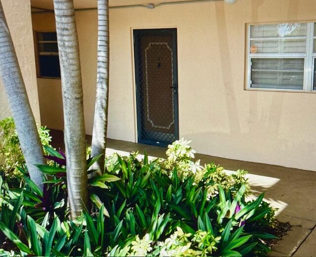 6100 Northwest 2nd Avenue, Unit 129 Boca Raton, FL 33487 - Photo 3 of 9 a front view of a house