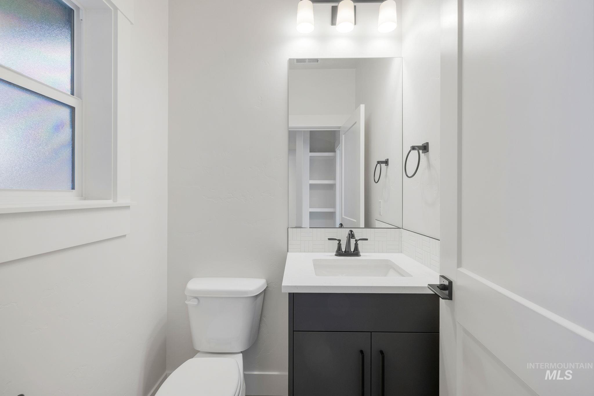 18 Ogden Street Cascade, ID 83611 - Photo 19 of 39 Bathroom with vanity and toilet