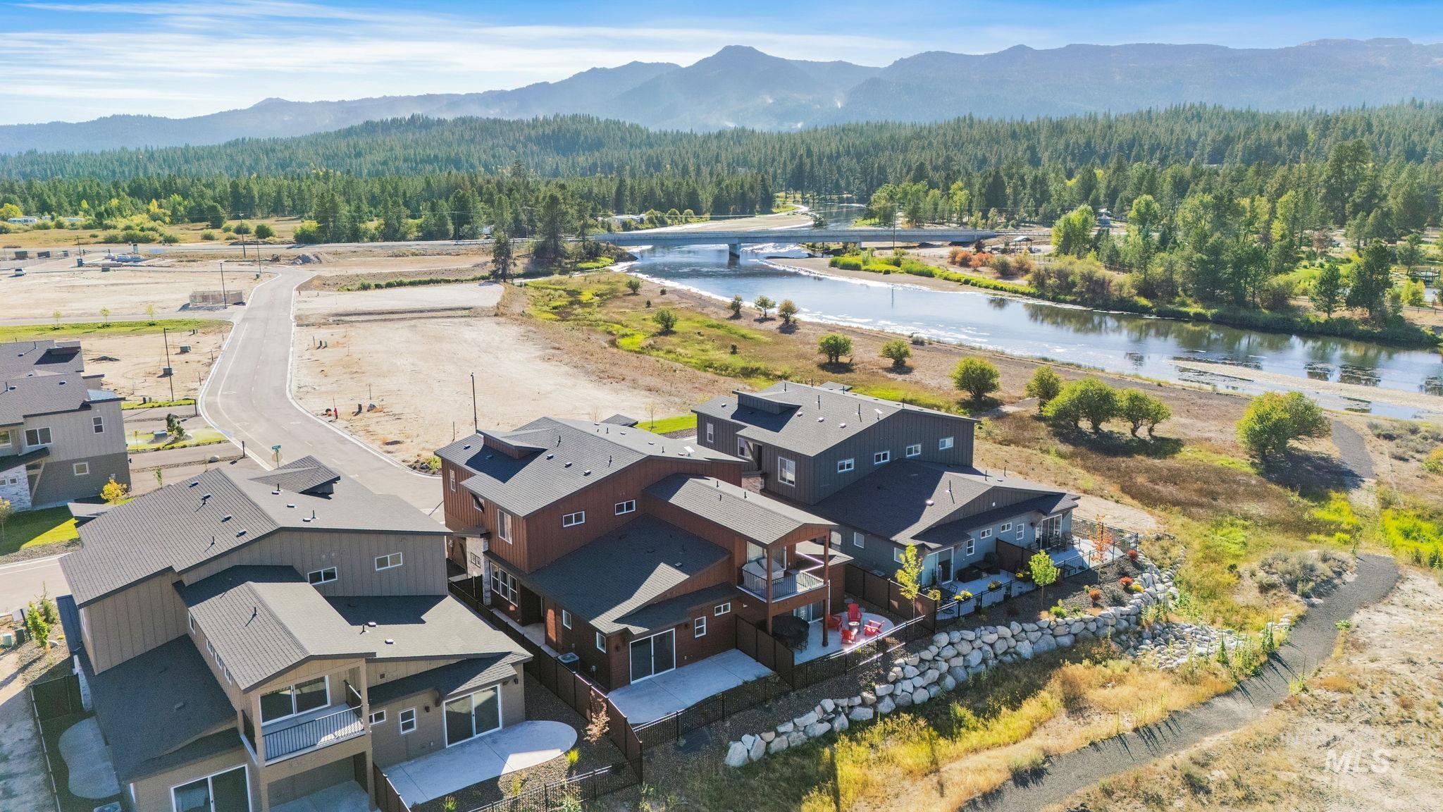 18 Ogden Street Cascade, ID 83611 - Photo 3 of 39 Aerial view of a forest and a water and mountain view
