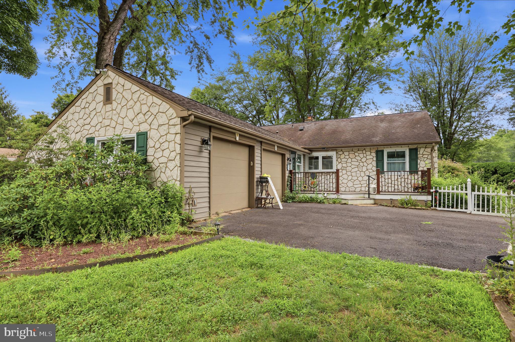 1011 Bristol Road Southampton, PA 18966 - Photo 1 of 35 Charming stone-front home with greenery.