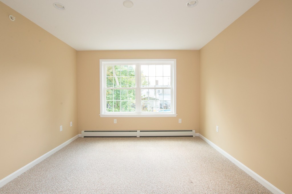 17 Arcade Street, Unit B Northbridge, MA 01588 - Photo 17 of 29 an empty room with a window