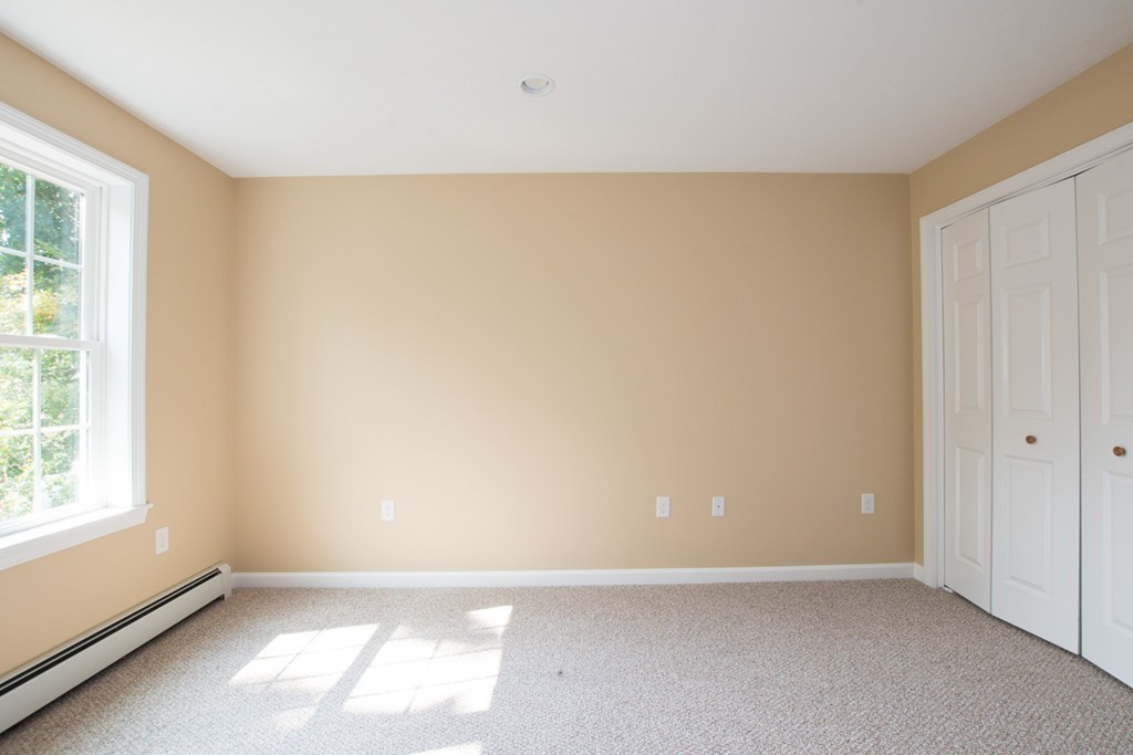 17 Arcade Street, Unit B Northbridge, MA 01588 - Photo 20 of 29 an empty room with windows