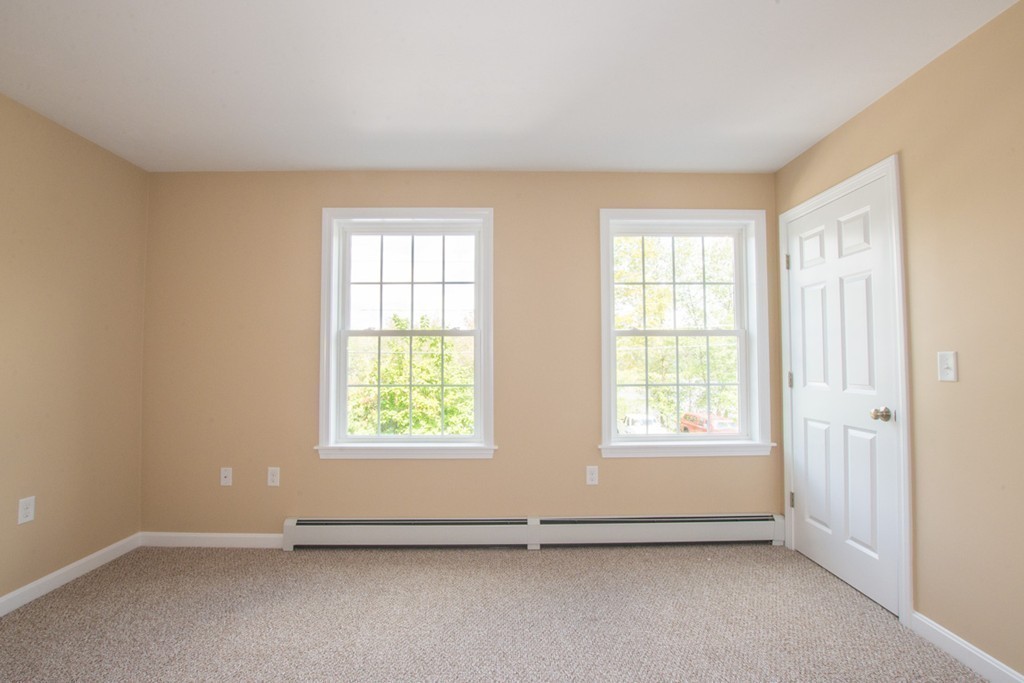 17 Arcade Street, Unit B Northbridge, MA 01588 - Photo 22 of 29 an empty room with windows