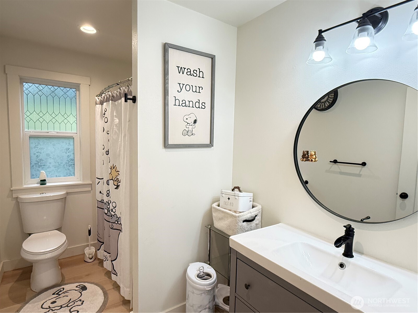 403 A Street South Bend, WA 98586 - Photo 16 of 20 a bathroom with a toilet a sink and a mirror