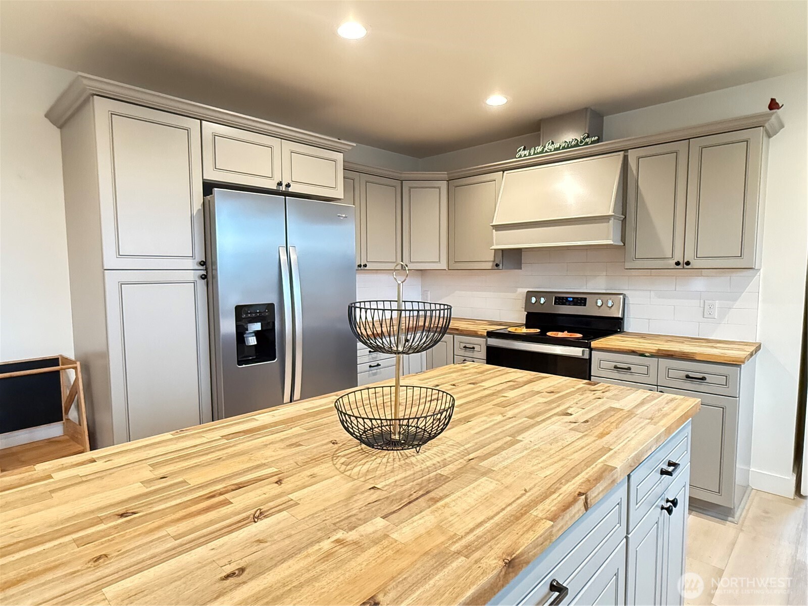 403 A Street South Bend, WA 98586 - Photo 8 of 20 a kitchen with a refrigerator and a stove top oven
