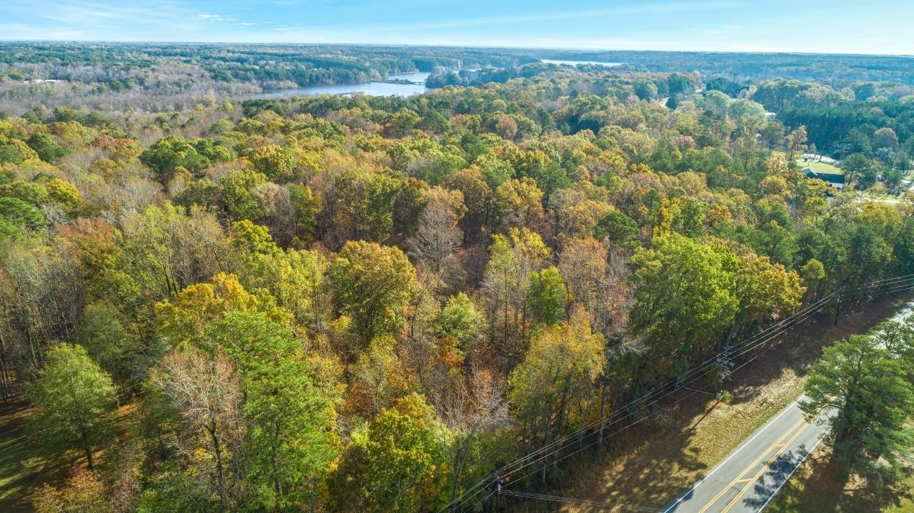 0 Penny Road Raleigh, NC 27606 - Photo 7 of 7 a view of a city with lush green forest
