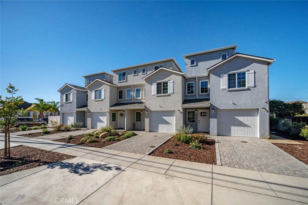 529 South Pine Street Santa Maria, CA 93458 - Photo 2 of 53 a front view of a house with a yard
