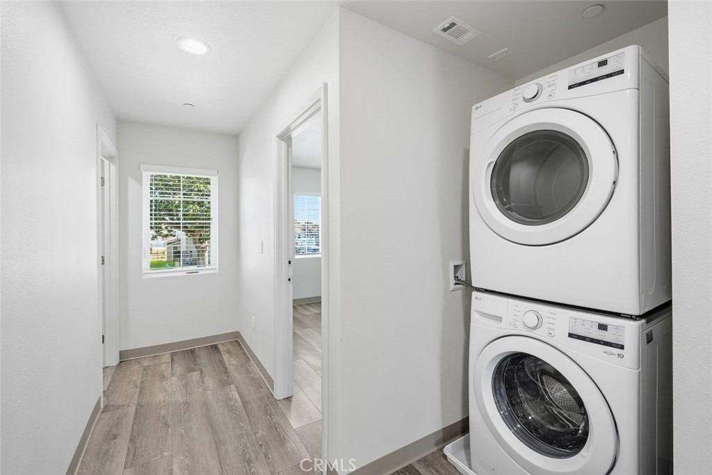 529 South Pine Street Santa Maria, CA 93458 - Photo 24 of 53 a view of a hallway with washer and dryer