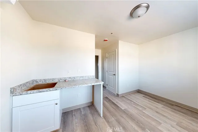 a storage room with wooden floor