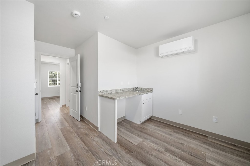 529 South Pine Street Santa Maria, CA 93458 - Photo 28 of 53 a view of a room with wooden floor