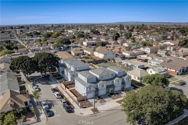 an aerial view of a house with a garden