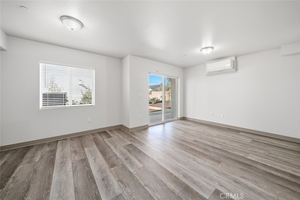 529 South Pine Street Santa Maria, CA 93458 - Photo 5 of 53 wooden floor in an empty room with a window