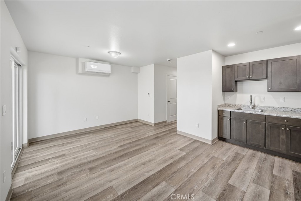 529 South Pine Street Santa Maria, CA 93458 - Photo 8 of 53 a view of kitchen with wooden floor