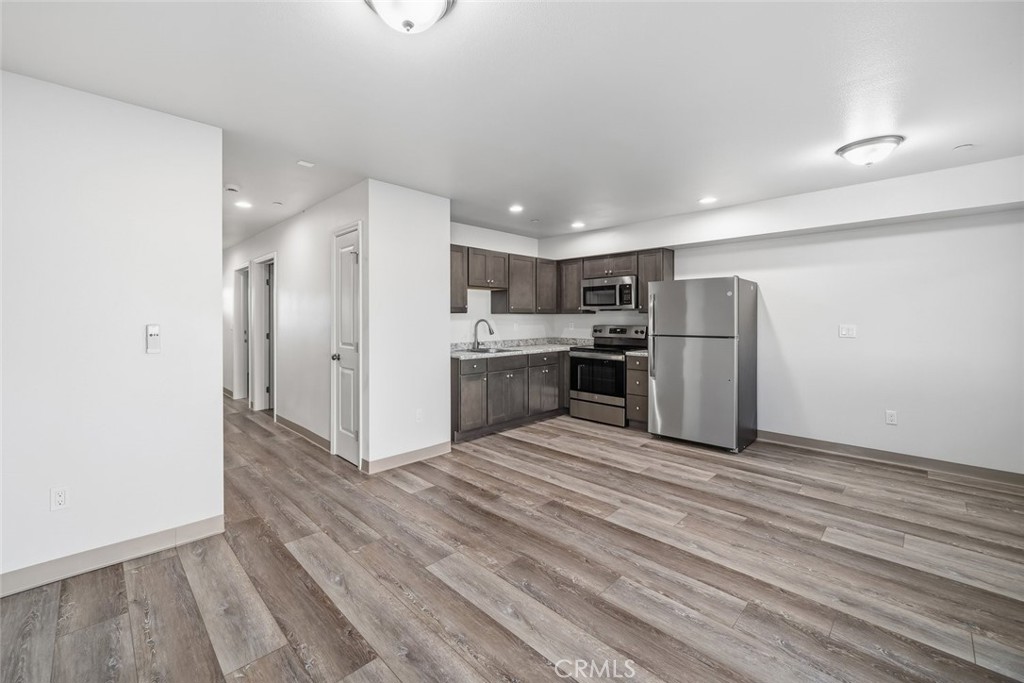 529 South Pine Street Santa Maria, CA 93458 - Photo 10 of 53 a view of kitchen appliances refrigerator microwave and cabinets