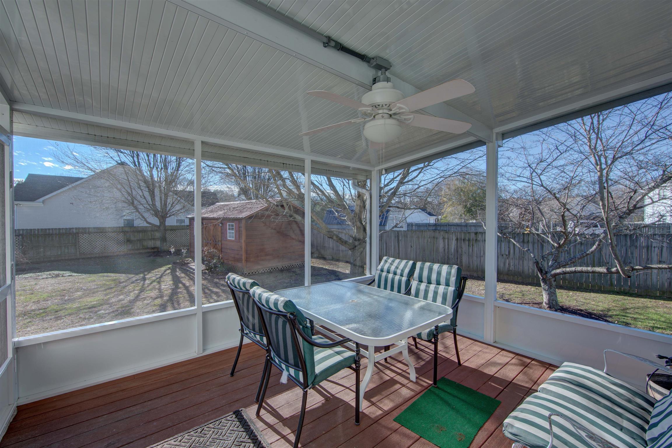 1801 O'Reilly Circle Spring Hill, TN 37174 - Photo 6 of 22 Just off the kitchen and family room this Southern inspired screened porch provides wonderful expanded living space