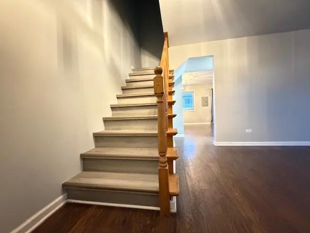 a view of entryway with wooden floor