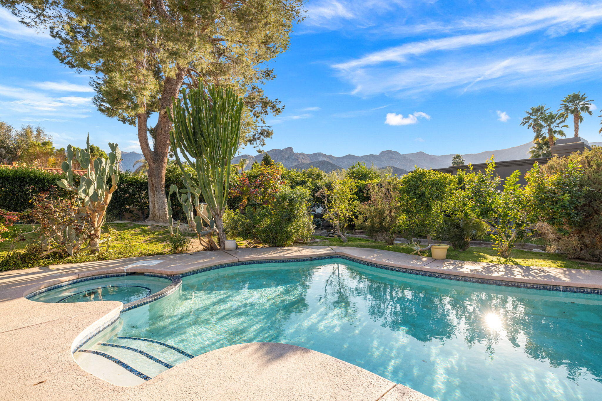 40675 East Thunderbird Terrace Rancho Mirage, CA 92270 - Photo 12 of 58 a view of swimming pool from a yard