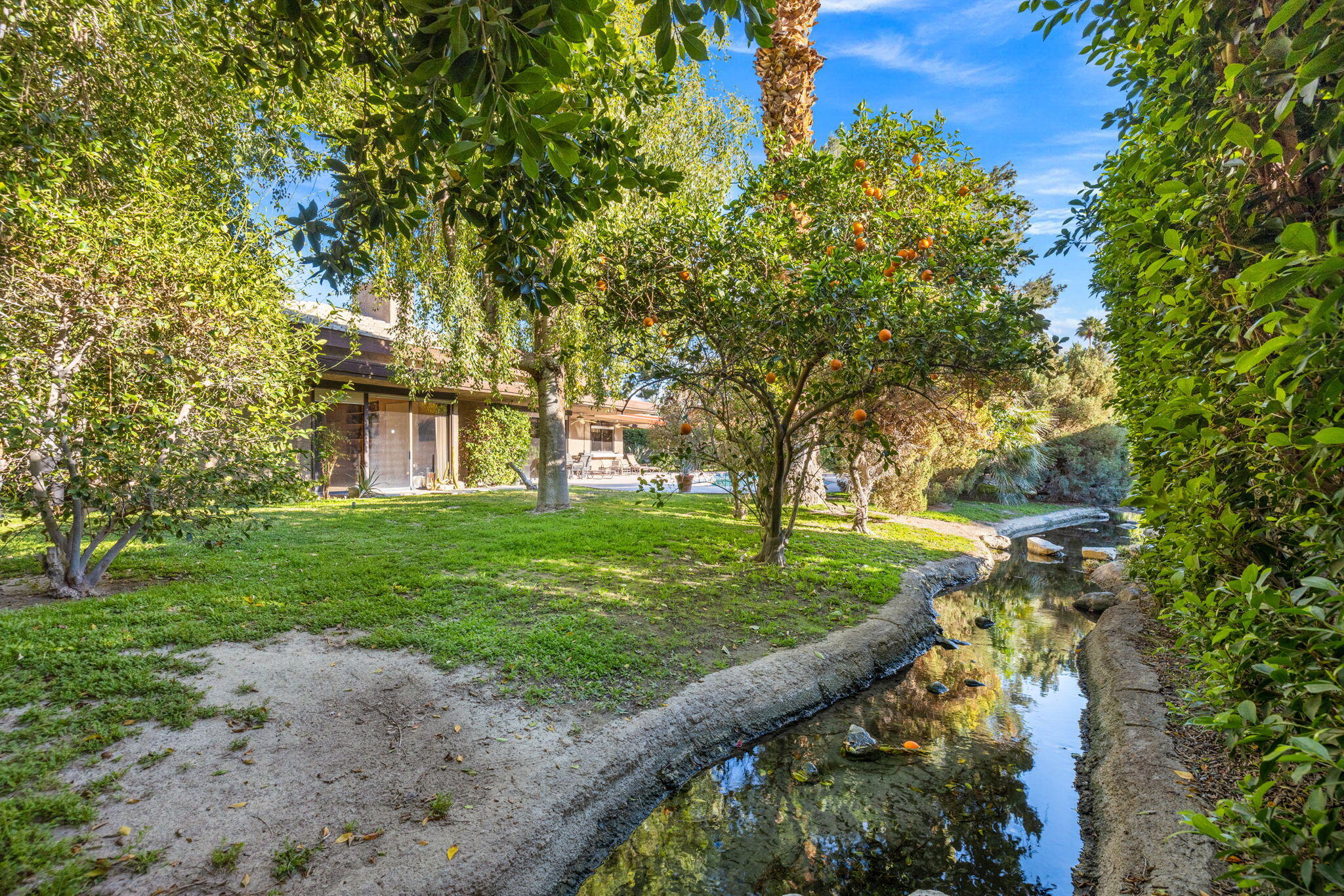 40675 East Thunderbird Terrace Rancho Mirage, CA 92270 - Photo 18 of 58 a view of a trees with a yard