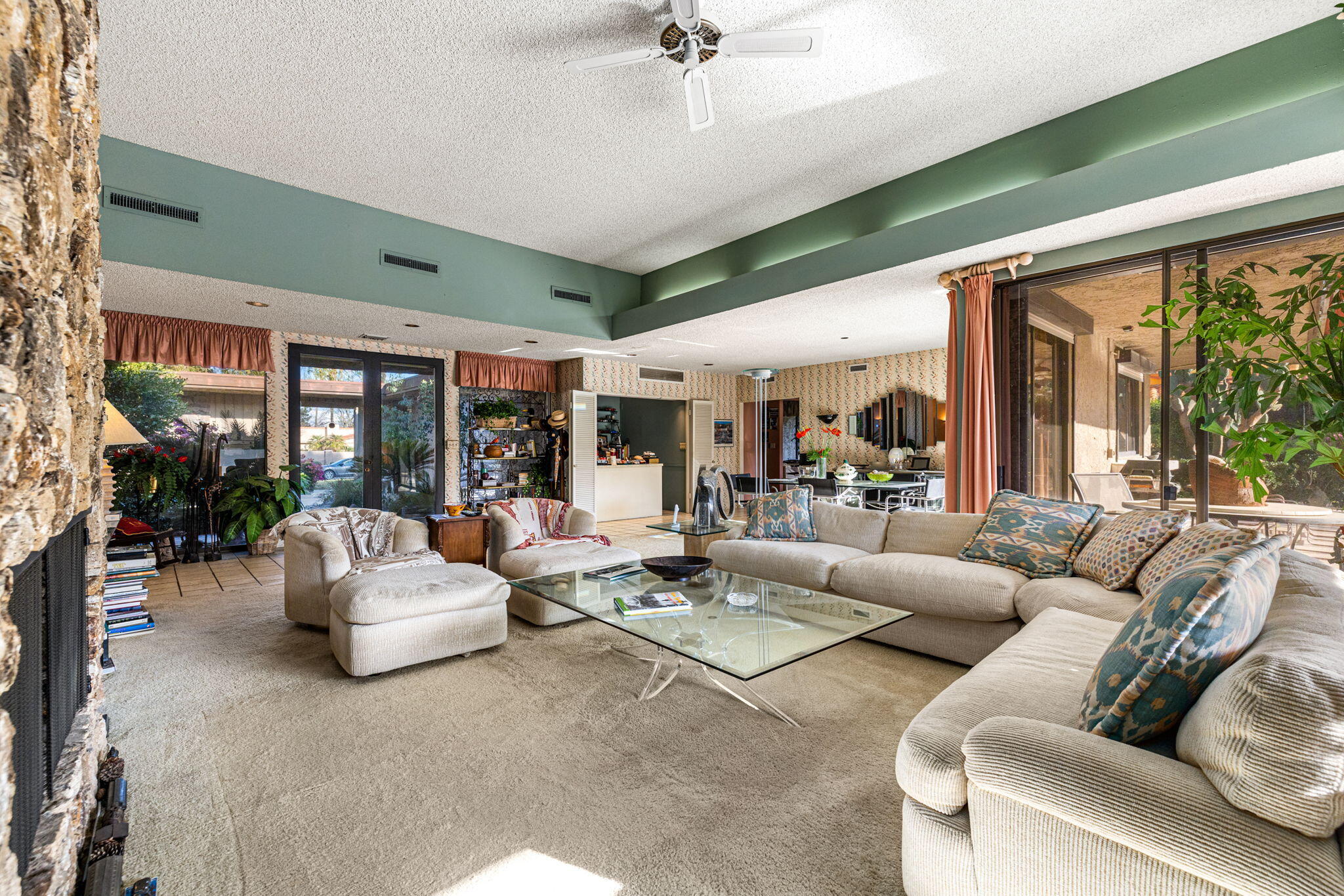 40675 East Thunderbird Terrace Rancho Mirage, CA 92270 - Photo 24 of 58 a living room with furniture and a large window