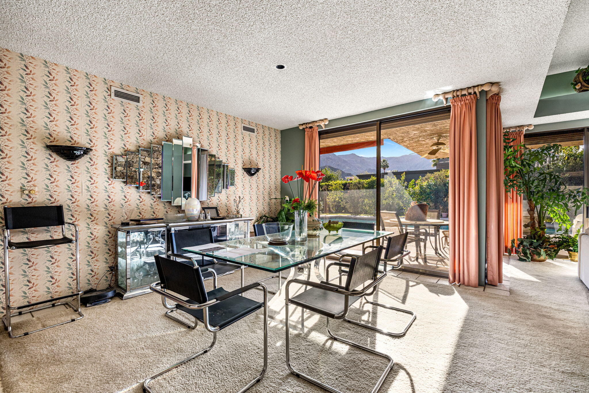 40675 East Thunderbird Terrace Rancho Mirage, CA 92270 - Photo 32 of 58 a view of a livingroom with furniture and a flat screen tv