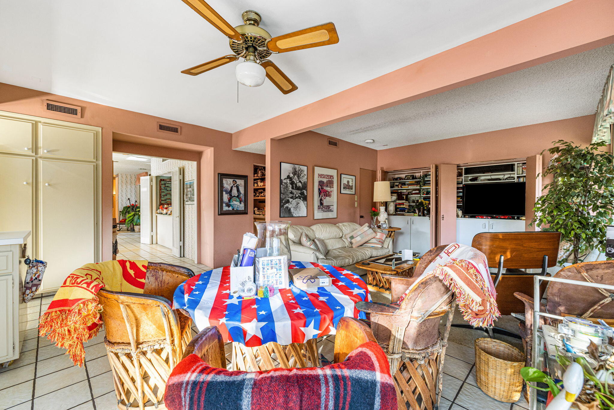40675 East Thunderbird Terrace Rancho Mirage, CA 92270 - Photo 42 of 58 a very nice looking living room with a flat screen tv and floor to ceiling window