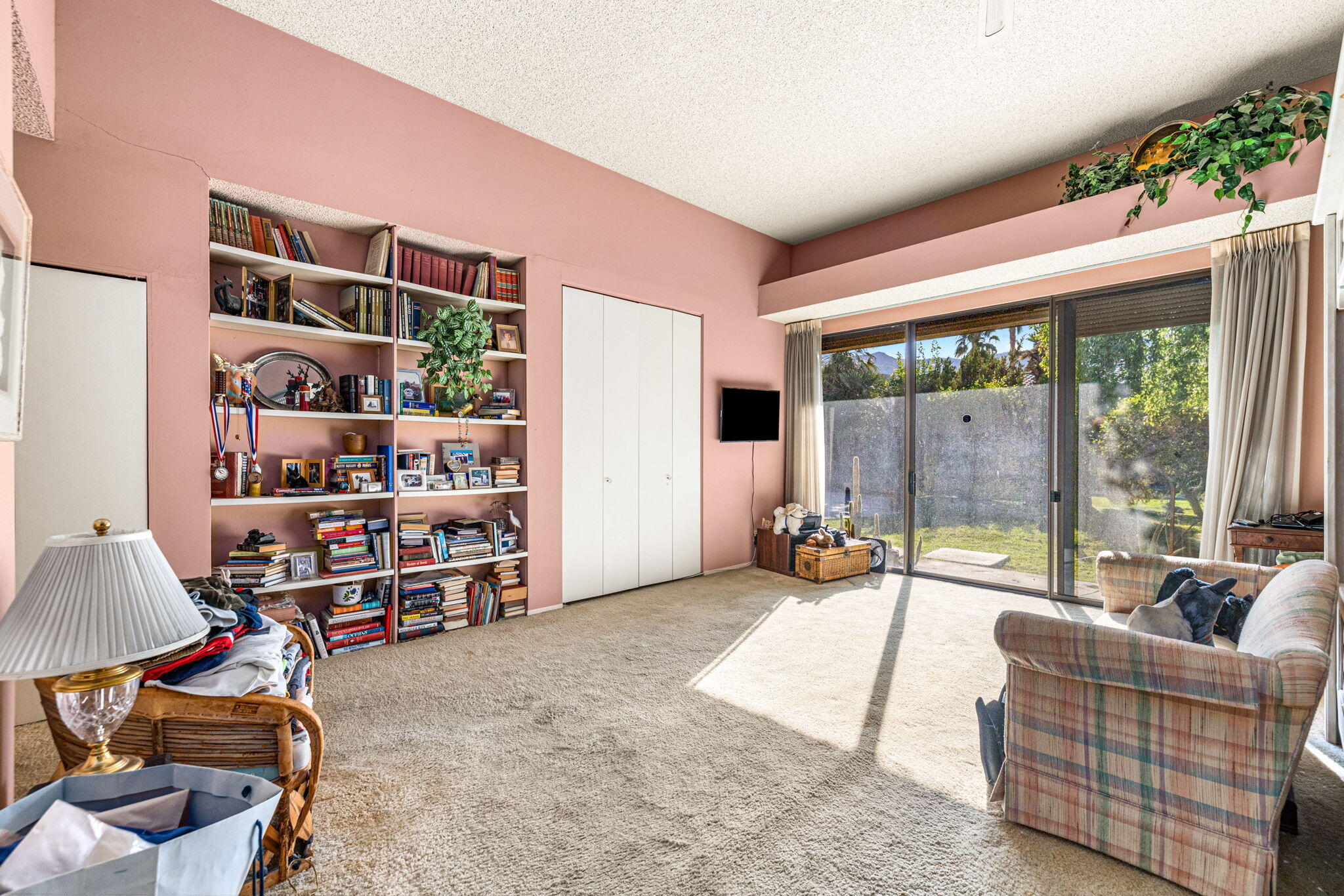 40675 East Thunderbird Terrace Rancho Mirage, CA 92270 - Photo 45 of 58 a living room with furniture toys and a large window